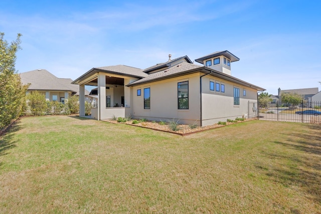 510 Doe Whisper Way, Austin, TX 78738 - rear view of house featuring a ceiling fan and stucco siding