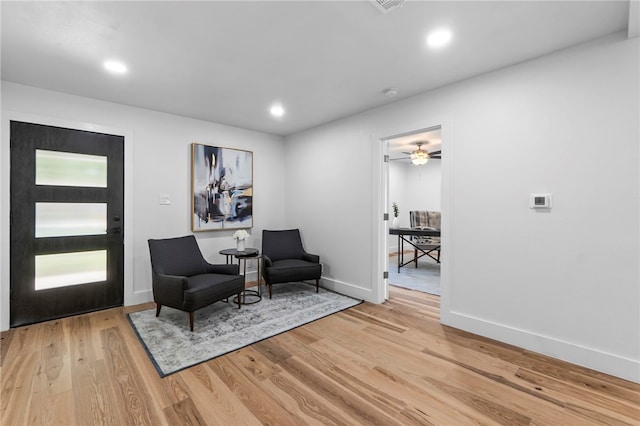1004 Cripple Creek Dr, Austin, TX 78758 - sitting room with baseboards, light wood-style floors, and recessed lighting