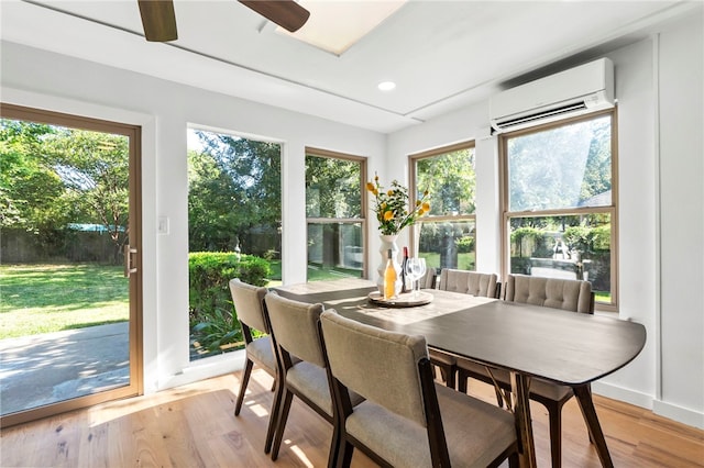 1004 Cripple Creek Dr, Austin, TX 78758 - sunroom with baseboards, recessed lighting, wood finished floors, and an AC wall unit
