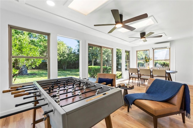 1004 Cripple Creek Dr, Austin, TX 78758 - rec room with a wall mounted air conditioner, light wood-type flooring, recessed lighting, and a ceiling fan