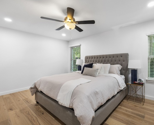 1004 Cripple Creek Dr, Austin, TX 78758 - bedroom featuring a ceiling fan, recessed lighting, baseboards, and wood finished floors