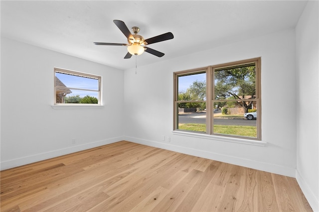 1004 Cripple Creek Dr, Austin, TX 78758 - spare room featuring a ceiling fan, baseboards, and light wood-type flooring
