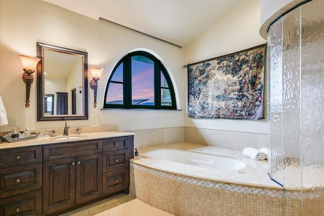 6704 Pixie Cv, Austin, TX 78746 - bathroom with vanity, a garden tub, lofted ceiling, and an enclosed shower