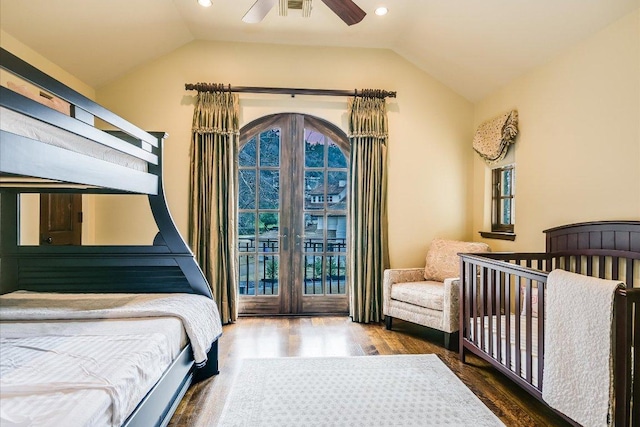 6704 Pixie Cv, Austin, TX 78746 - bedroom with multiple windows, wood finished floors, lofted ceiling, french doors, and recessed lighting