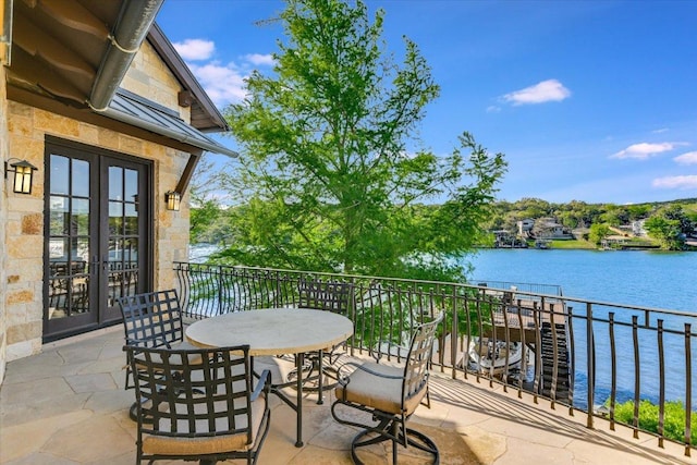 6704 Pixie Cv, Austin, TX 78746 - balcony featuring french doors and a water view