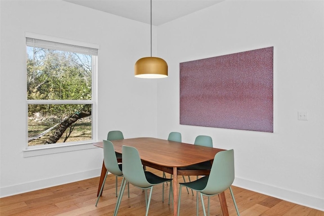 130 Volterra Ln, Dripping Springs, TX 78620 - dining room with wood finished floors and baseboards
