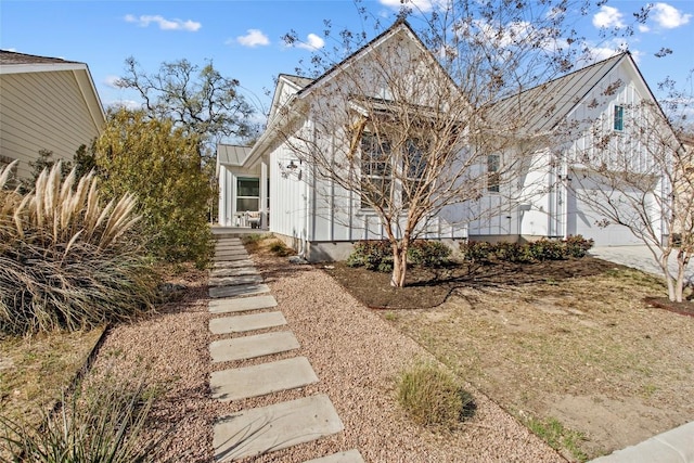 130 Volterra Ln, Dripping Springs, TX 78620 - view of front facade featuring metal roof and a standing seam roof