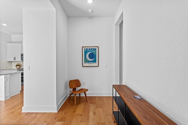 130 Volterra Ln, Dripping Springs, TX 78620 - hallway featuring recessed lighting, light wood-type flooring, and baseboards