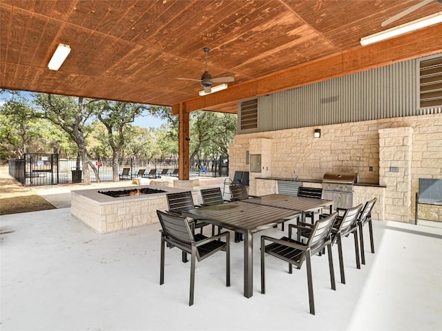 130 Volterra Ln, Dripping Springs, TX 78620 - view of patio / terrace featuring exterior kitchen and ceiling fan