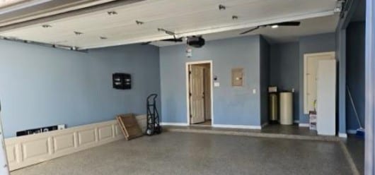 19500 Moorlynch Ave, Pflugerville, TX 78660 - garage with a garage door opener