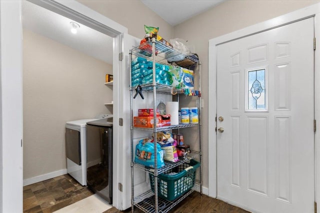 708 Baumgarten St, Schulenburg, TX 78956 - laundry area with washing machine and dryer and baseboards