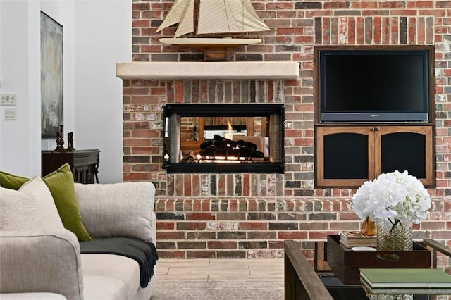 114 Flying Scot St, Lakeway, TX 78734 - living room with a fireplace and wood finished floors