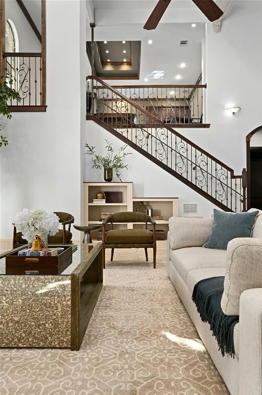 114 Flying Scot St, Lakeway, TX 78734 - living area with a high ceiling, ceiling fan, stairway, and recessed lighting