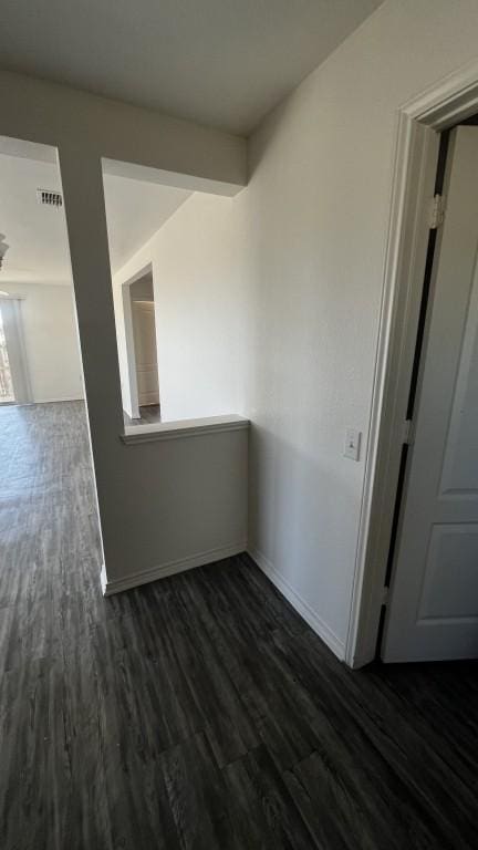 13217 Perconte Dr, Del Valle, TX 78617 - unfurnished room featuring dark wood-style floors and baseboards