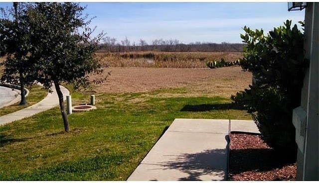 13217 Perconte Dr, Del Valle, TX 78617 - view of grassy yard featuring a rural view