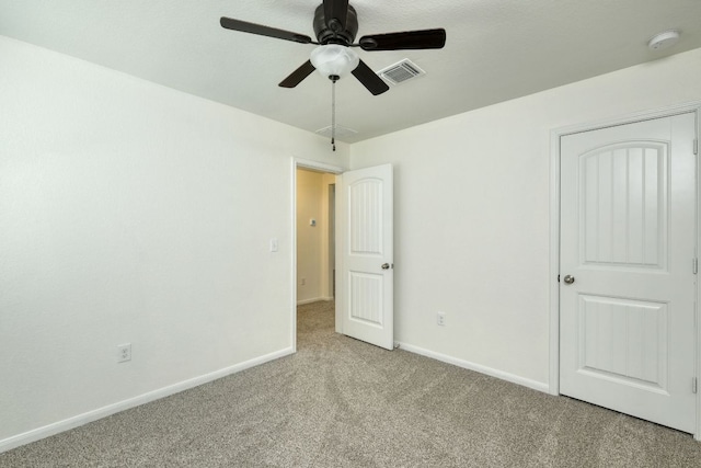 11648 Cambrian Rd, Manor, TX 78653 - unfurnished bedroom with carpet floors, baseboards, and ceiling fan