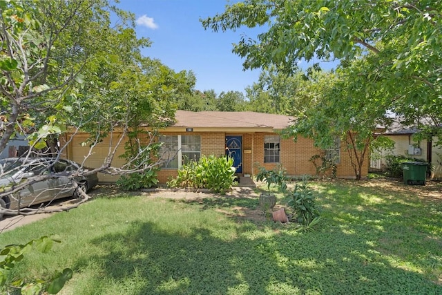 1905 Chestnut Ave, Austin, TX 78722 - single story home featuring brick siding and a front lawn
