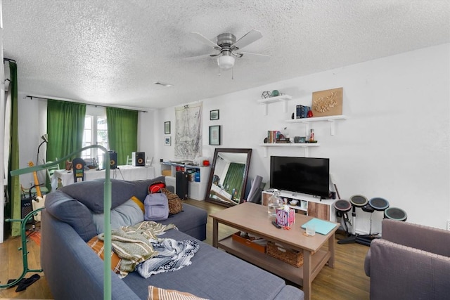 1905 Chestnut Ave, Austin, TX 78722 - living area with a textured ceiling, ceiling fan, and wood finished floors