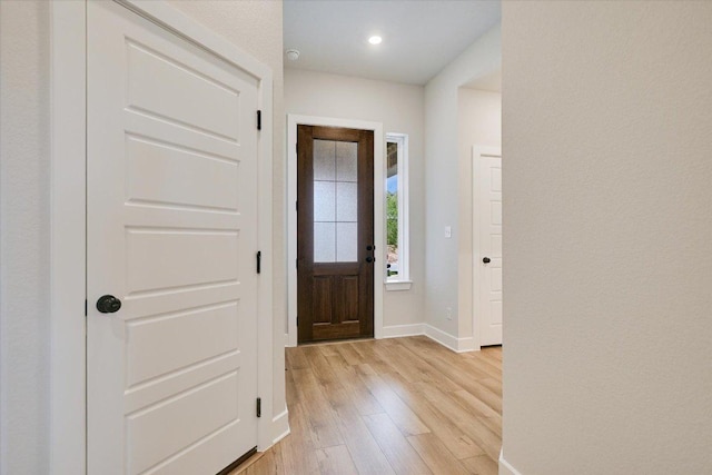 1409 S Brook Dr, Leander, TX 78641 - foyer entrance with light wood finished floors and recessed lighting