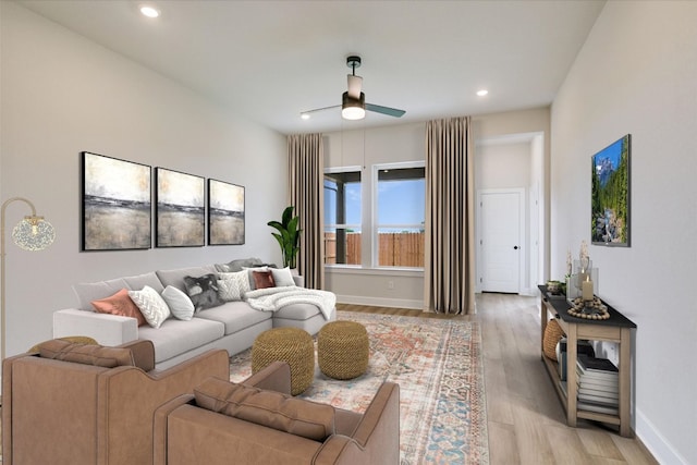1409 S Brook Dr, Leander, TX 78641 - living area with a ceiling fan, light wood-style flooring, and recessed lighting