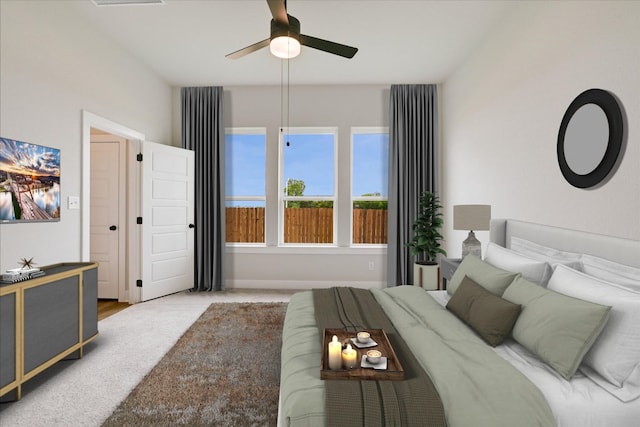 1409 S Brook Dr, Leander, TX 78641 - carpeted bedroom featuring baseboards and ceiling fan