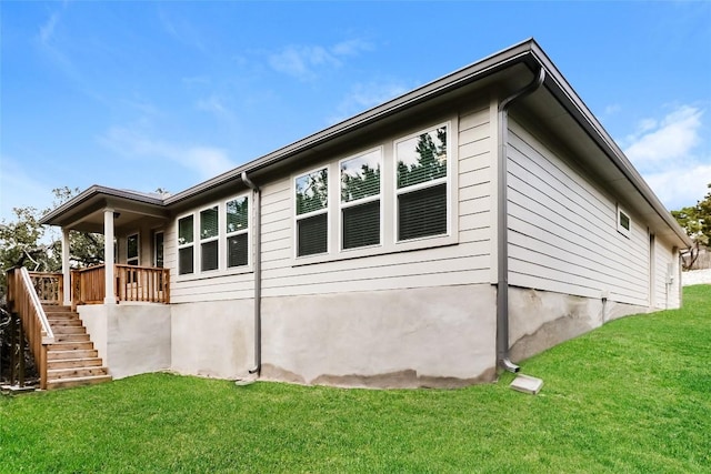 20411 Rockpark Ln, Lago Vista, TX 78645 - view of home's exterior with a yard and stairs