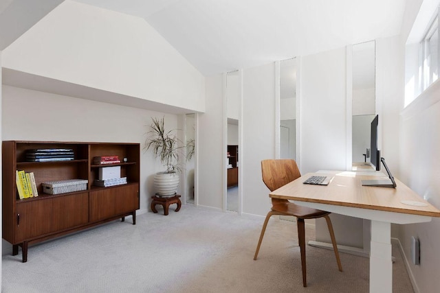 carpeted office with high vaulted ceiling
