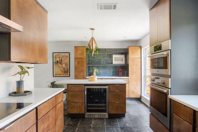 9307 Queenswood Dr, Austin, TX 78748 - kitchen featuring wine cooler, range hood, light countertops, brown cabinets, and black electric cooktop