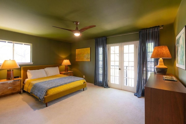 bedroom with carpet flooring, ceiling fan, access to outside, and french doors