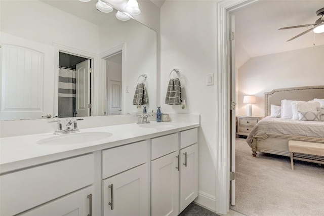 212 Tovas Secret Cv, Georgetown, TX 78628 - bathroom with ensuite bathroom, double vanity, ceiling fan, and a sink