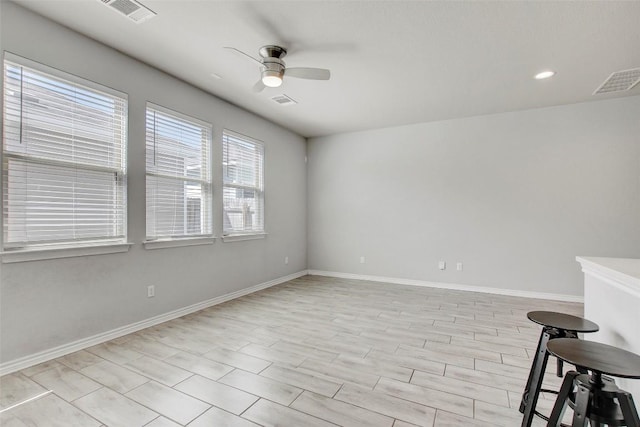 1813 Artesian Springs Xing, Leander, TX 78641 - empty room featuring a ceiling fan and recessed lighting