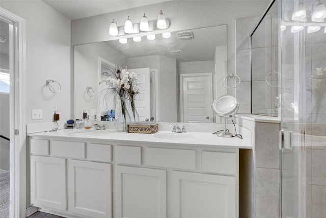 1813 Artesian Springs Xing, Leander, TX 78641 - full bath with a stall shower and double vanity