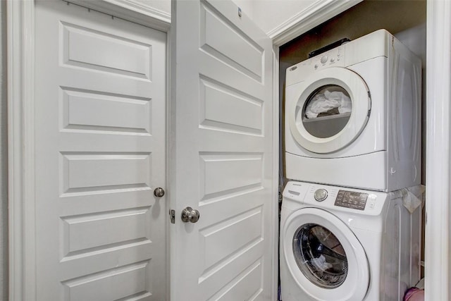 1813 Artesian Springs Xing, Leander, TX 78641 - washroom with stacked washer / dryer