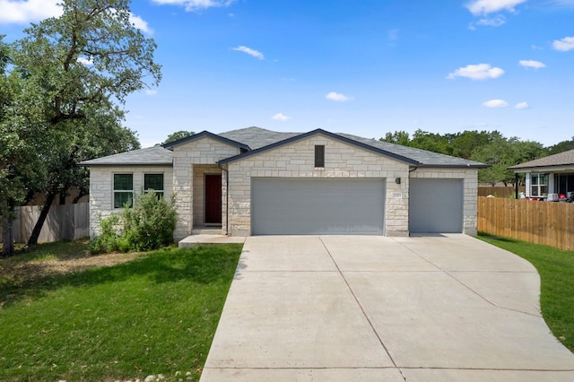 21203 Santa Rosa Ave, Lago Vista, TX 78645 - view of front of property featuring stone siding, concrete driveway, and a garage