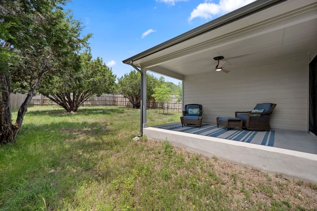 21203 Santa Rosa Ave, Lago Vista, TX 78645 - fenced backyard featuring ceiling fan and a wooden deck