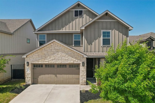 600 Saturnia Dr, Georgetown, TX 78628 - craftsman inspired home with an attached garage, board and batten siding, driveway, and stone siding