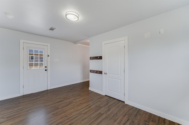 155 Travis Ln, Spicewood, TX 78669 - spare room featuring dark wood-type flooring and baseboards