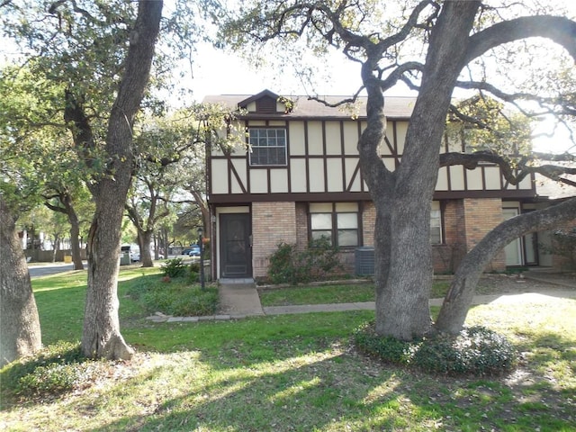 3501 Greystone Dr Unit 3501, Austin, TX 78731 - view of front of property with brick siding and a front yard