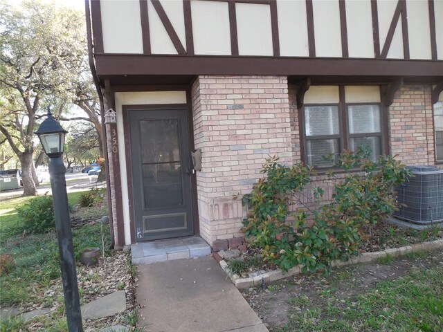 3501 Greystone Dr Unit 3501, Austin, TX 78731 - doorway to property with brick siding