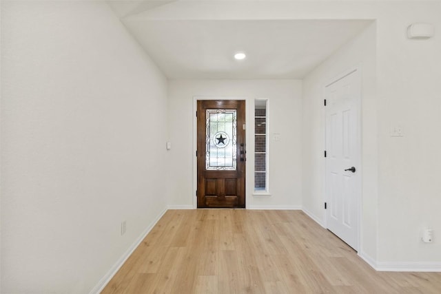 471 Bayou Bend Dr, Buda, TX 78610 - entryway with light wood-style floors and baseboards