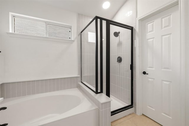 471 Bayou Bend Dr, Buda, TX 78610 - bathroom with a garden tub, a shower stall, and tile patterned flooring