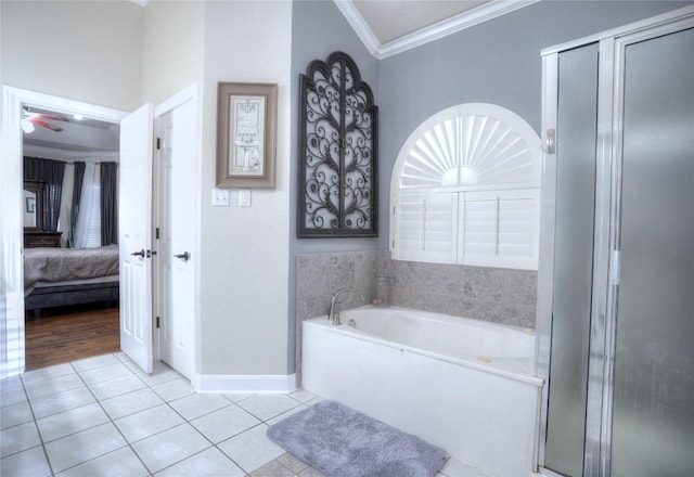 4209 N Sunflower Ln, Temple, TX 76502 - bathroom featuring crown molding, a bath, tile patterned flooring, ensuite bath, and baseboards