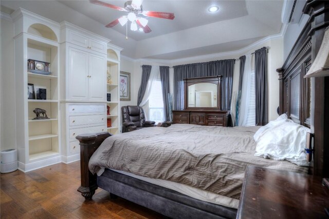 4209 N Sunflower Ln, Temple, TX 76502 - bedroom featuring a raised ceiling, dark wood-type flooring, recessed lighting, ceiling fan, and crown molding