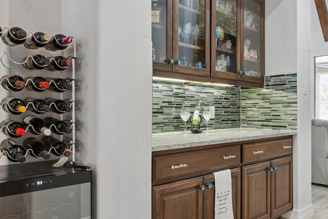 3801 Panther Hall, Leander, TX 78641 - bar featuring backsplash and a textured wall