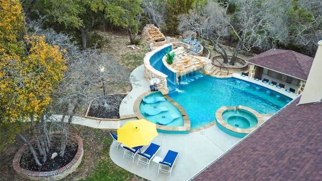 3801 Panther Hall, Leander, TX 78641 - view of pool featuring a pool with connected hot tub and a patio