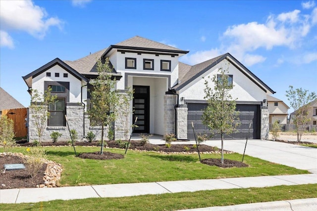 18716 Hopper Ln, Austin, TX 78738 - view of front of house featuring driveway, an attached garage, stucco siding, stone siding, and a front lawn