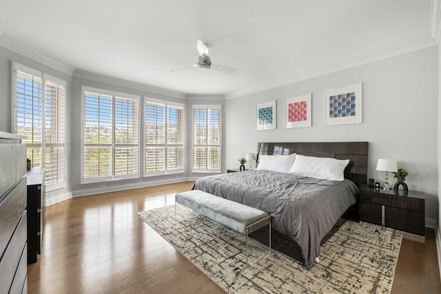 2807 Round Table Rd, Austin, TX 78746 - bedroom with ornamental molding, wood finished floors, and a ceiling fan