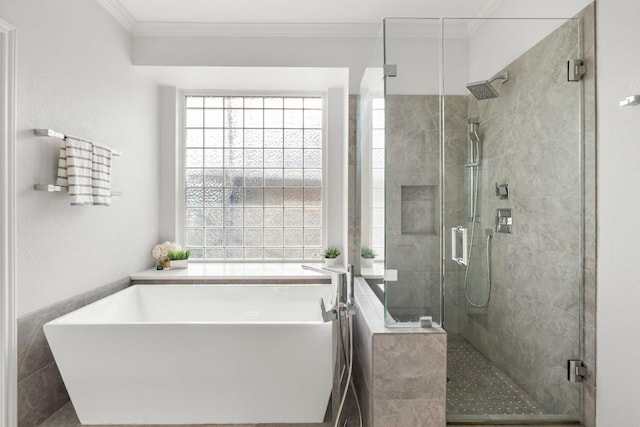 2807 Round Table Rd, Austin, TX 78746 - bathroom with a freestanding tub, a stall shower, and ornamental molding