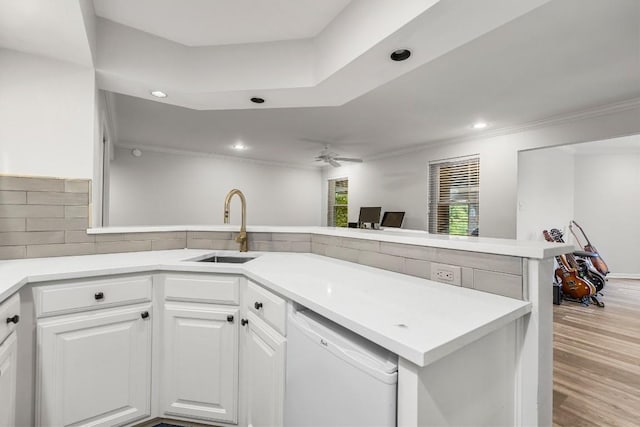 2807 Round Table Rd, Austin, TX 78746 - kitchen featuring dishwasher, a peninsula, recessed lighting, white cabinetry, and ceiling fan
