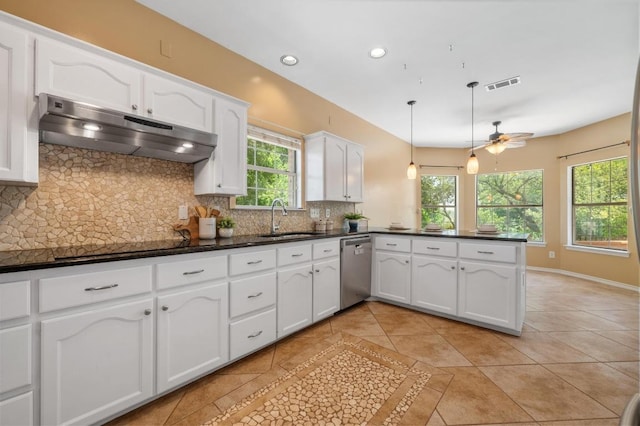 314 Hurst Creek Rd, Lakeway, TX 78734 - kitchen featuring under cabinet range hood, dishwasher, a sink, dark countertops, and recessed lighting